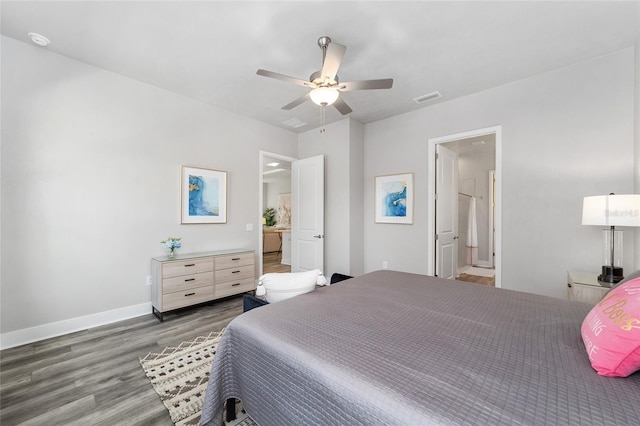 1035 NW 132nd Blvd, Newberry, FL 32669 - bedroom with wood finished floors, baseboards, and a ceiling fan