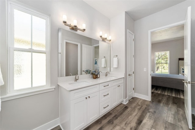 bathroom with vanity and hardwood / wood-style floors