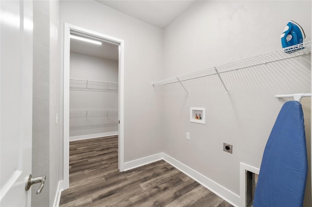 1035 NW 132nd Blvd, Newberry, FL 32669 - clothes washing area with hookup for an electric dryer, hookup for a washing machine, dark wood-style flooring, and baseboards