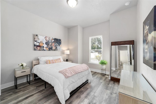 1035 NW 132nd Blvd, Newberry, FL 32669 - bedroom with wood finished floors and baseboards