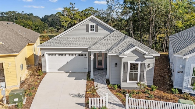 front of property with a garage