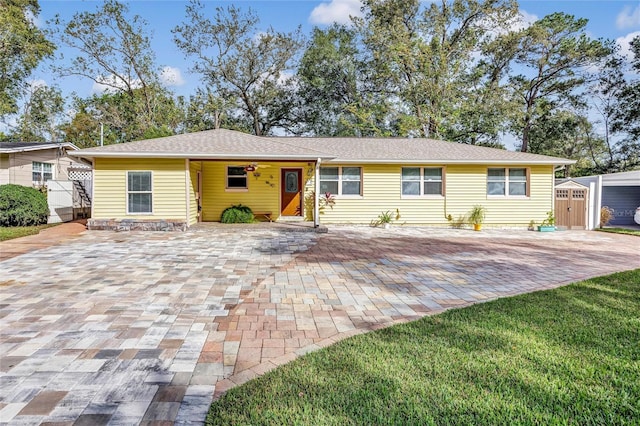 ranch-style home featuring a patio