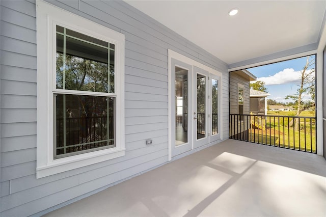 1029 NW 132nd Blvd, Newberry, FL 32669 - unfurnished sunroom featuring healthy amount of natural light and french doors