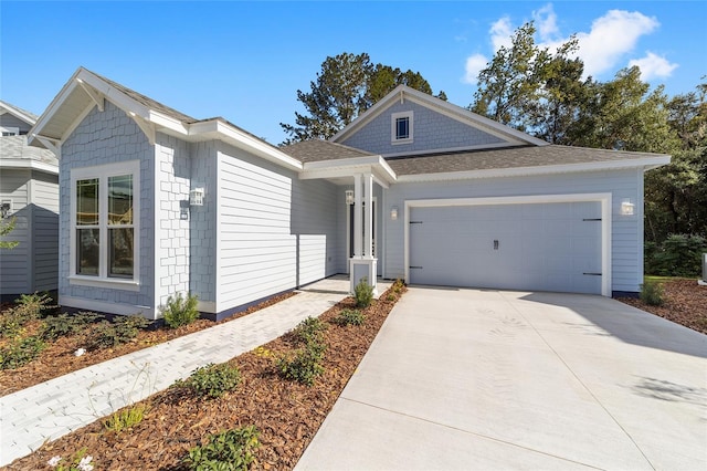 view of front of property featuring a garage