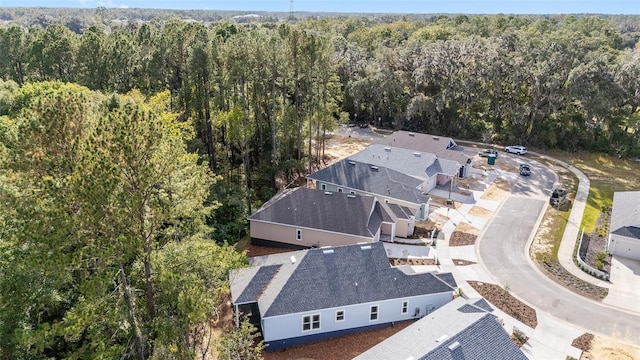 1029 NW 132nd Blvd, Newberry, FL 32669 - aerial view of property and surrounding area featuring a heavily wooded area