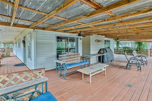 wooden terrace featuring grilling area