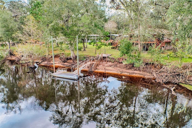 dock area featuring a water view