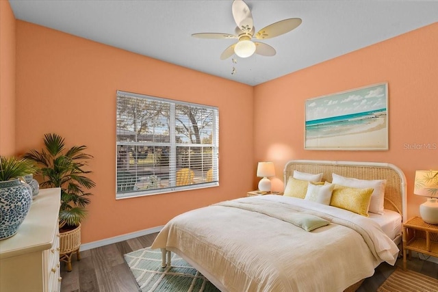 bedroom featuring ceiling fan and hardwood / wood-style floors