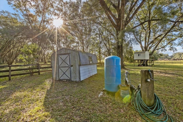 view of outbuilding featuring a yard