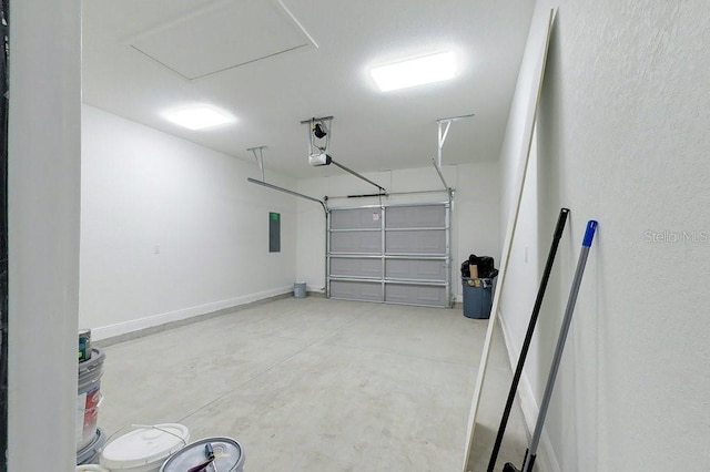 garage with electric panel and a garage door opener