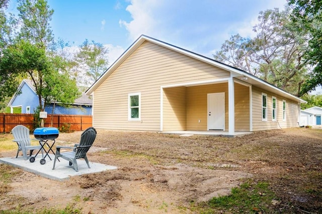 back of house featuring a patio area