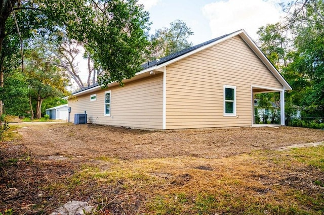 view of home's exterior with cooling unit