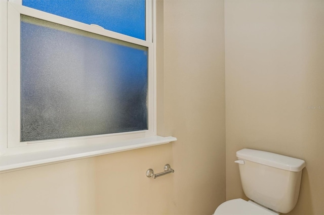 bathroom featuring toilet