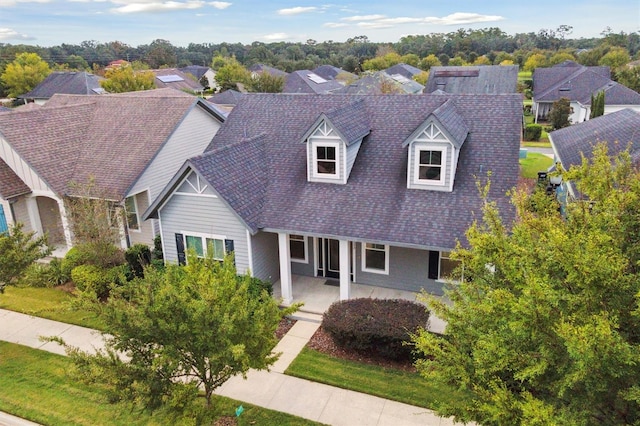 view of new england style home