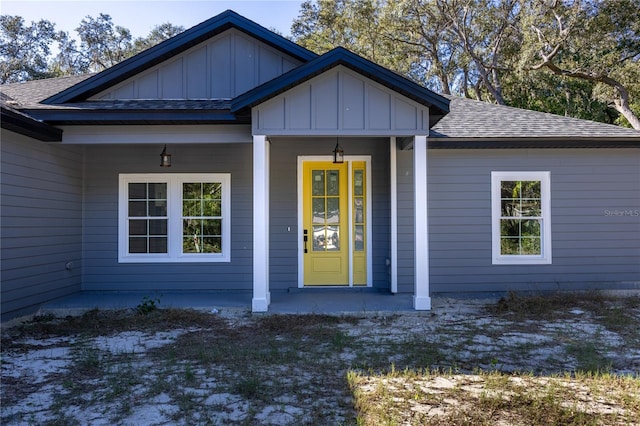 entrance to property with covered porch