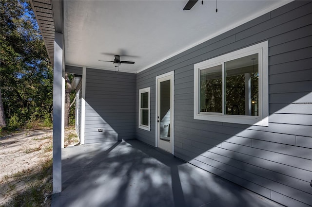 view of patio / terrace featuring ceiling fan