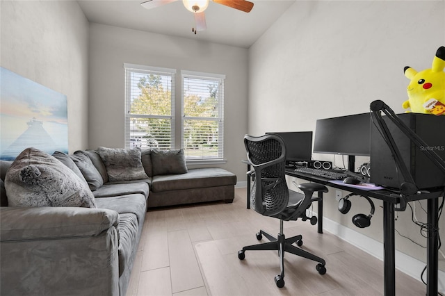 office area featuring ceiling fan and light wood-type flooring