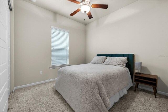 1237 NW 137th Way, Newberry, FL 32669 - bedroom with baseboards, light colored carpet, and a ceiling fan