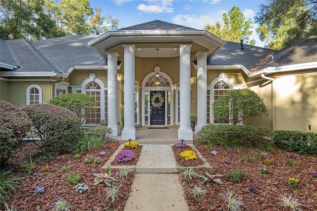 entrance to property with covered porch