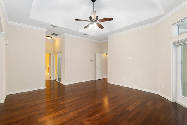 empty room with dark wood-type flooring, ornamental molding, and ceiling fan