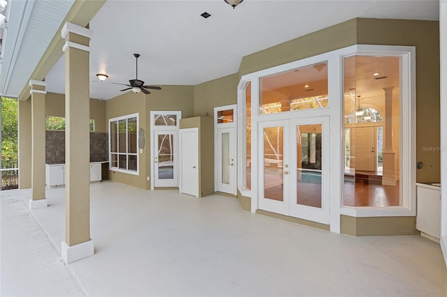 view of patio with french doors and ceiling fan