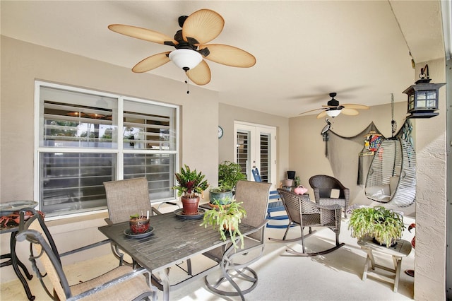 view of patio featuring ceiling fan