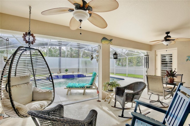 sunroom featuring a swimming pool