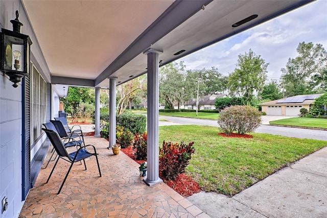 view of patio / terrace with a garage