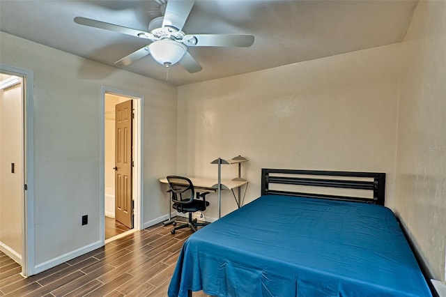 bedroom with hardwood / wood-style floors and ceiling fan