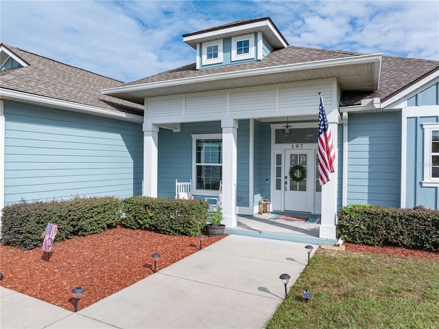 property entrance with a porch