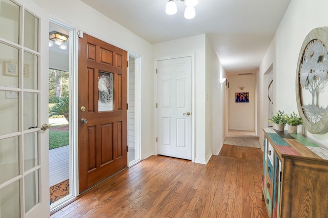 entrance foyer featuring hardwood / wood-style flooring