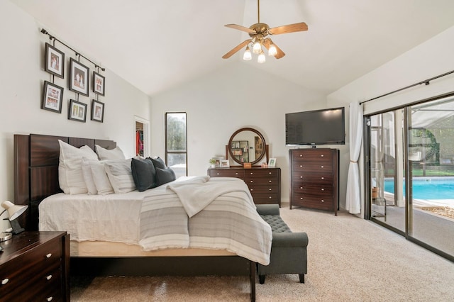 bedroom featuring ceiling fan, access to exterior, lofted ceiling, and multiple windows