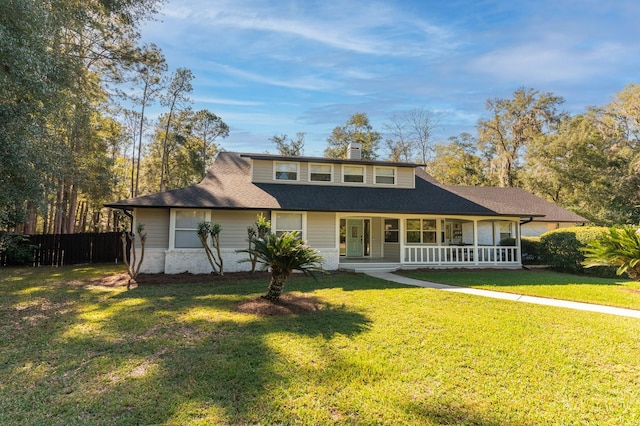 view of front facade featuring a porch and a front yard