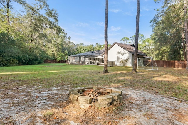 view of yard with an outdoor fire pit