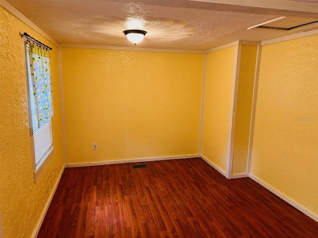 unfurnished room featuring dark hardwood / wood-style floors