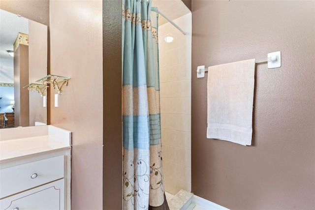 bathroom with vanity and a shower with curtain