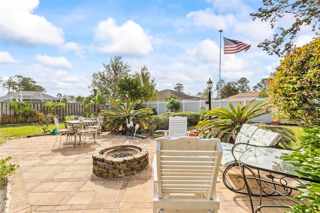 view of patio featuring an outdoor fire pit