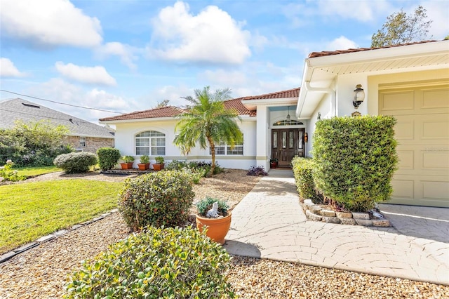 view of front of home with a garage