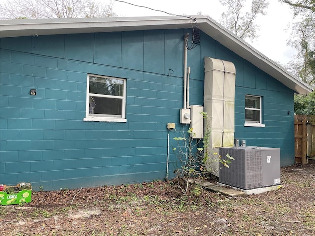 view of side of property featuring cooling unit