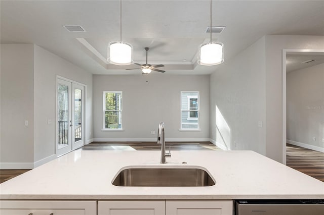 1023 NW 132nd Blvd, Newberry, FL 32669 - kitchen featuring a sink, open floor plan, plenty of natural light, and light countertops