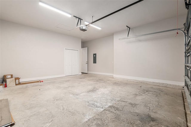 garage featuring a garage door opener and electric panel