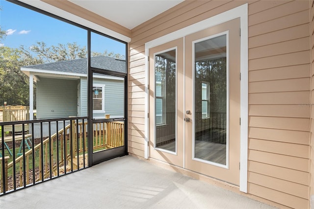 1023 NW 132nd Blvd, Newberry, FL 32669 - unfurnished sunroom with french doors