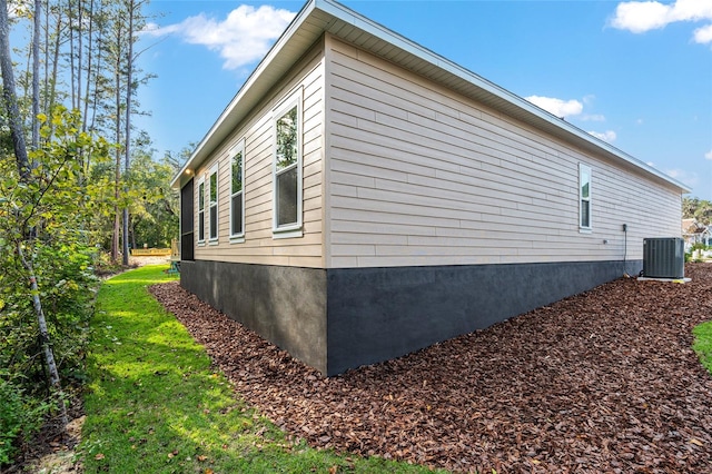 view of property exterior featuring central AC unit