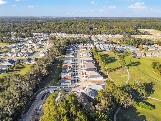 1023 NW 132nd Blvd, Newberry, FL 32669 - aerial view of property and surrounding area with nearby suburban area and a forest