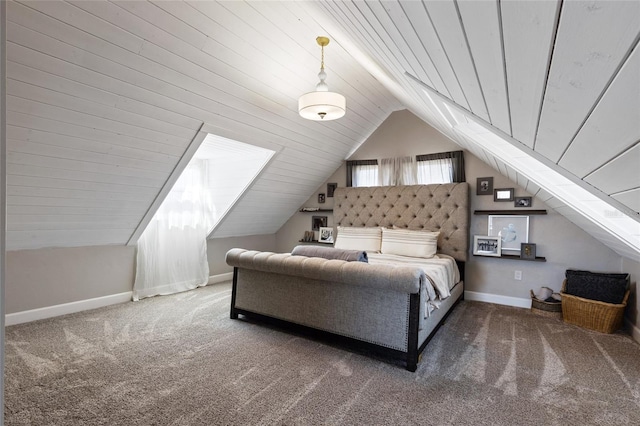 carpeted bedroom with vaulted ceiling and wooden ceiling