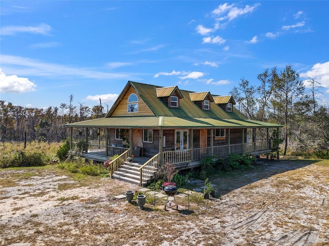 farmhouse featuring covered porch