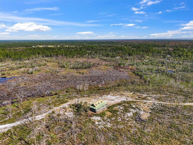 7550 SW 127th Ct, Cedar Key, FL 32625 - drone / aerial view of a heavily wooded area