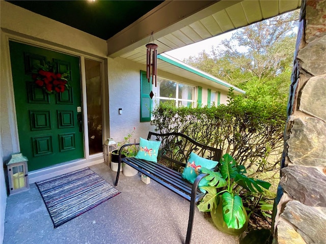 property entrance featuring covered porch