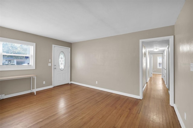 entrance foyer with light hardwood / wood-style floors