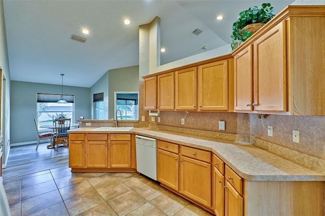 kitchen with backsplash, white dishwasher, sink, pendant lighting, and high vaulted ceiling